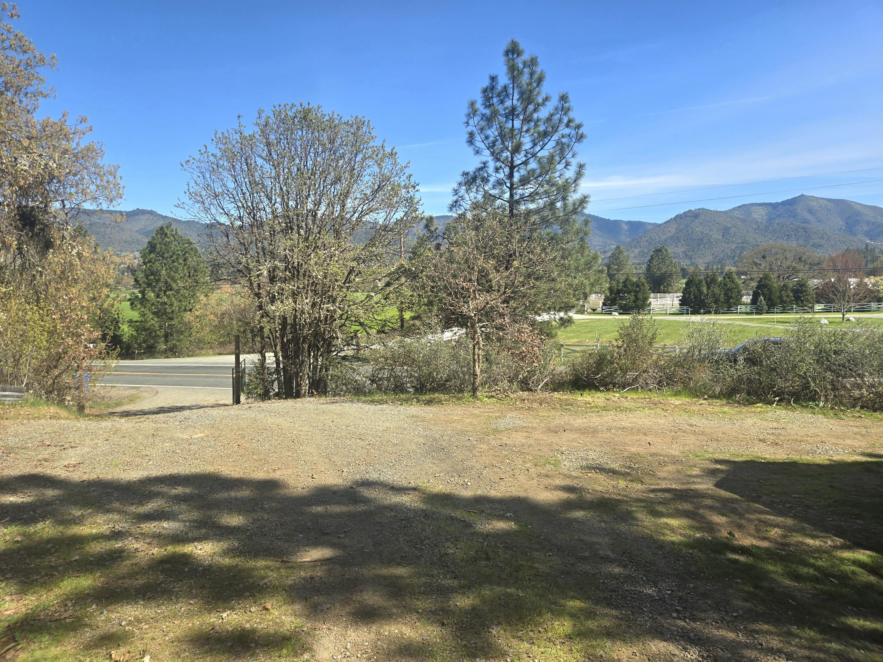 12726 Water Gap Road Williams, OR 97544 - Photo 4 of 47 a view of an outdoor space and a yard