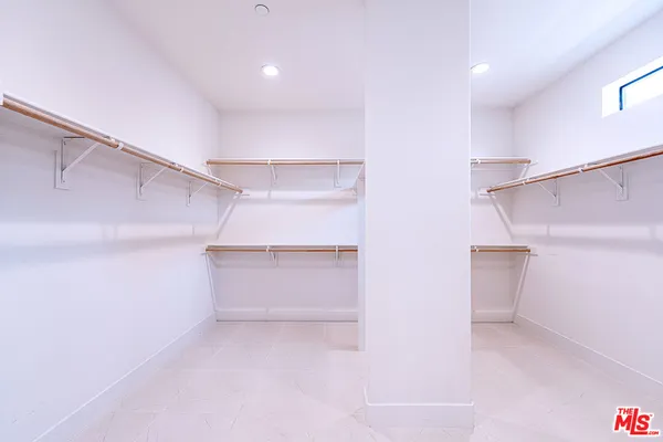 a bathroom with a shower and a toilet
