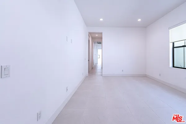 a bathroom with a shower and toilet