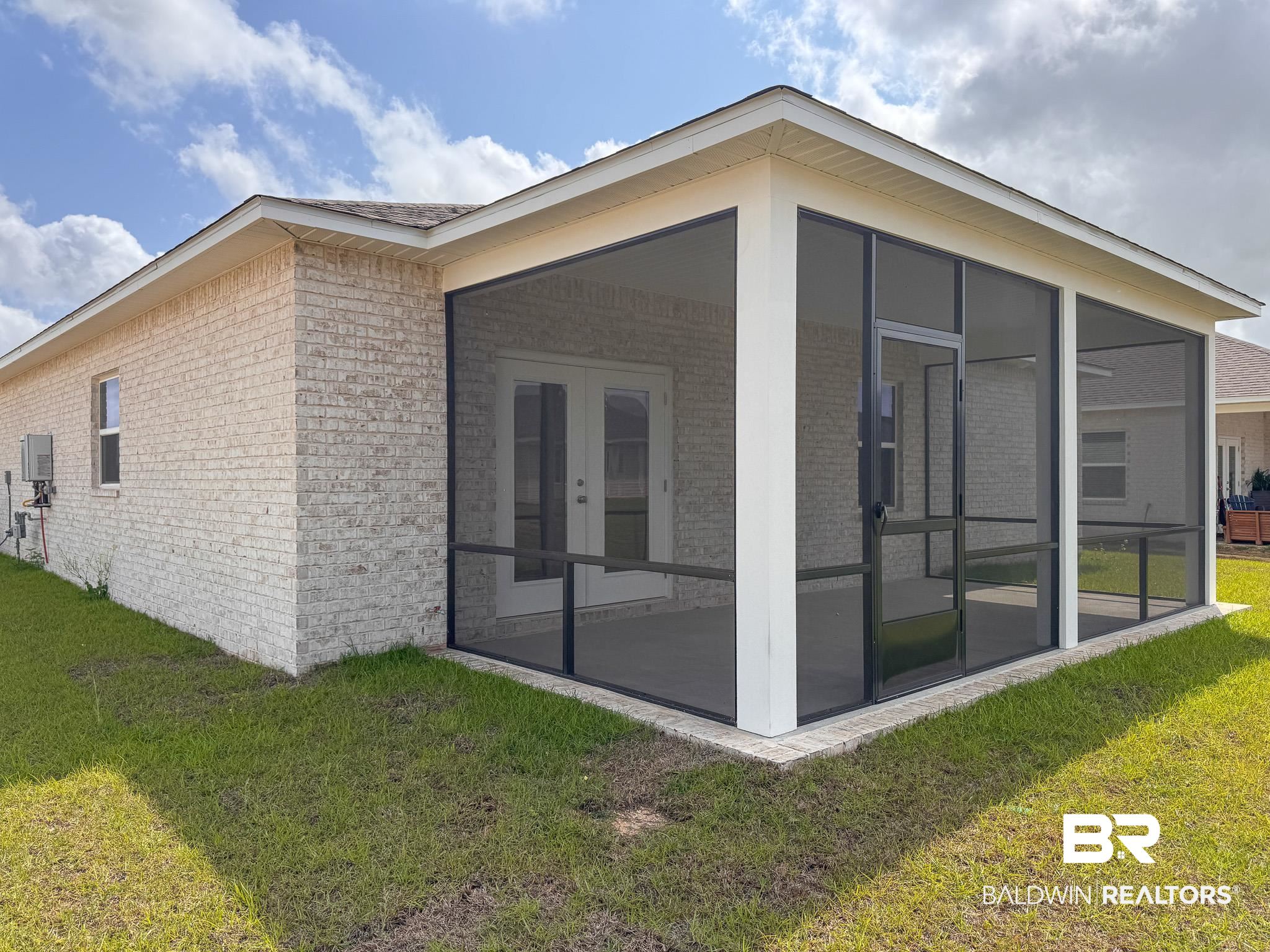 18151 Kent Circle Foley, AL 36535 - Photo 25 of 25 Screened porch with light brick exterior