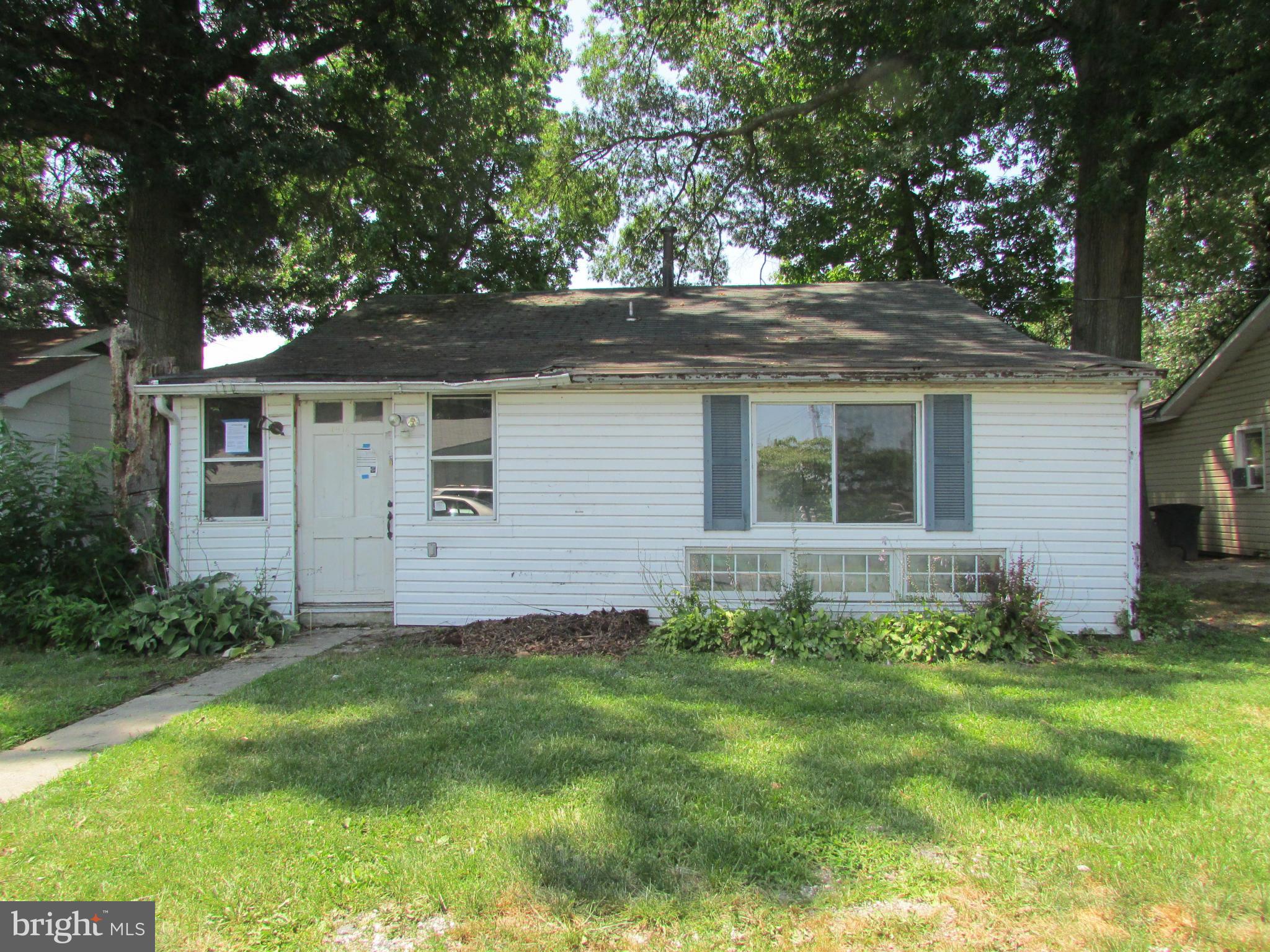 1416 2nd Road Baltimore, MD 21220 - Photo 1 of 11 a view of a house with a yard