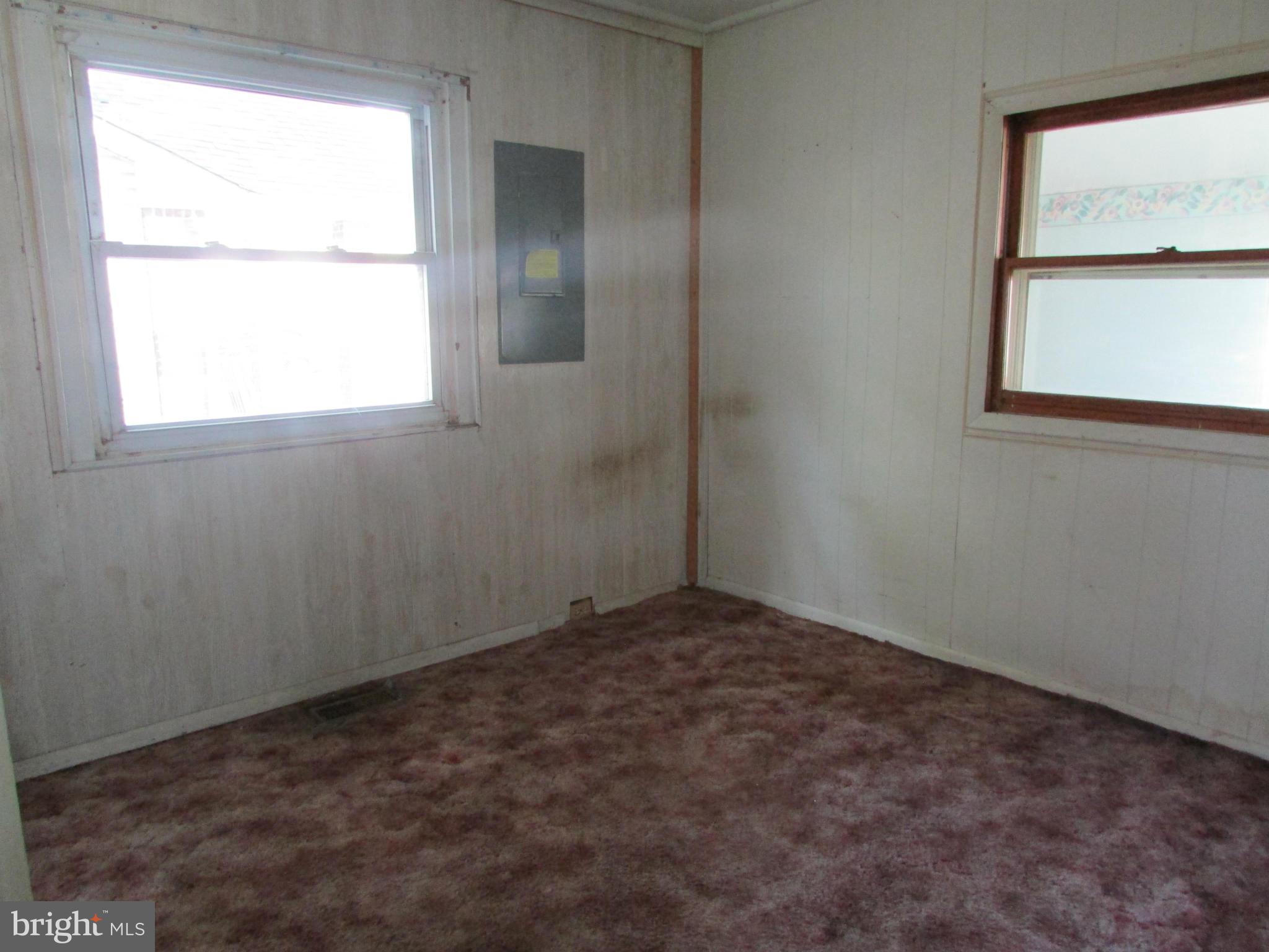 1416 2nd Road Baltimore, MD 21220 - Photo 6 of 11 an empty room with a window
