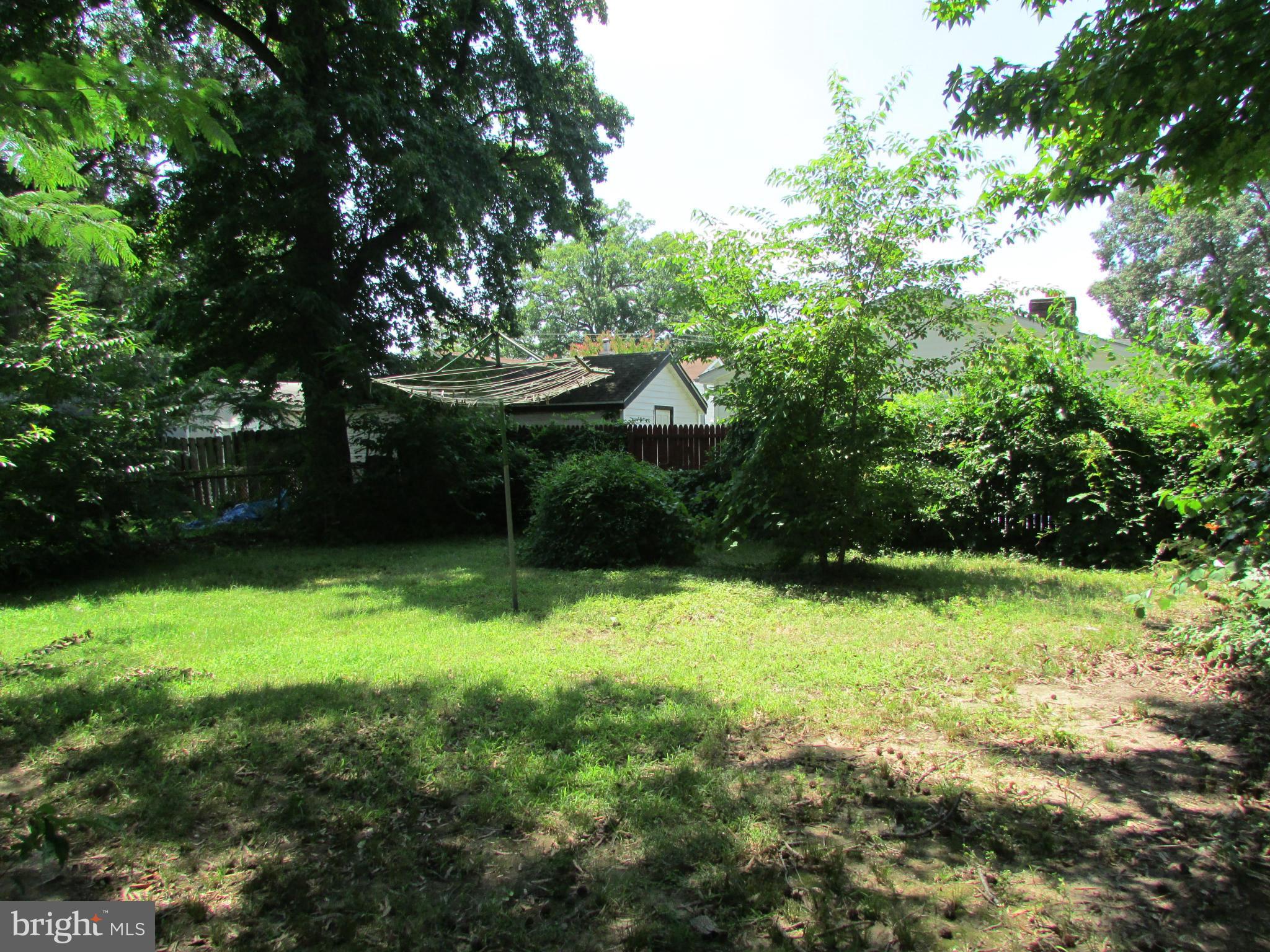 1416 2nd Road Baltimore, MD 21220 - Photo 10 of 11 a backyard of a house with lots of green space