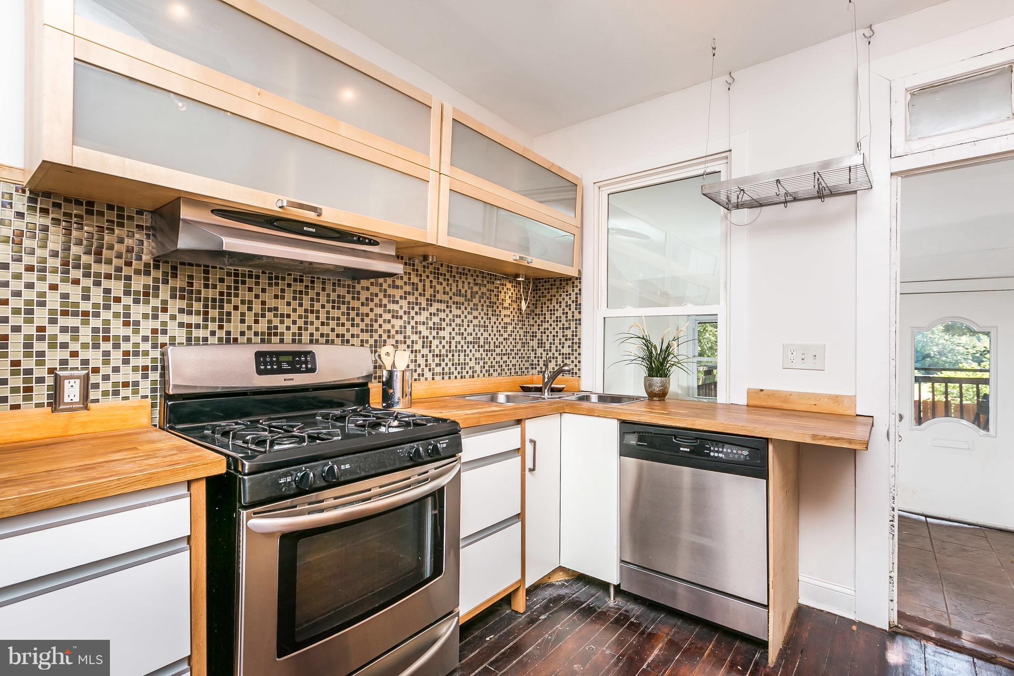 2921 Keswick Road Baltimore, MD 21211 - Photo 6 of 30 Modern kitchen has SS appliances