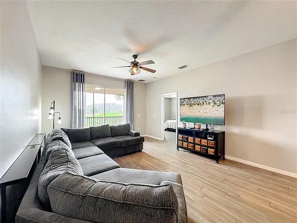 a bed room with a bed and a window