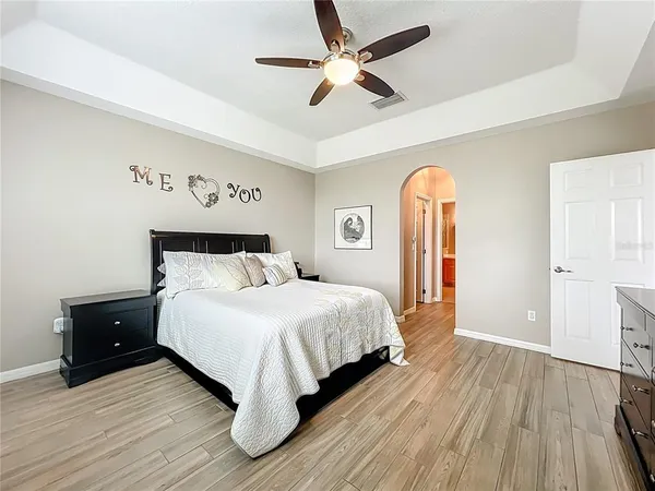 a view of livingroom with hardwood floor and a hallway