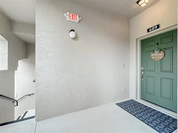 a kitchen with a sink and a stove top oven