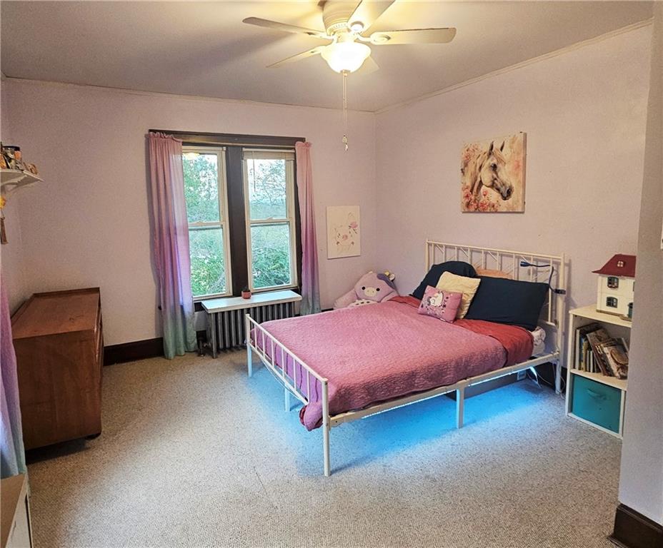 175 Blackfield Road Garrett, PA 15542 - Photo 17 of 37 a bedroom with a bed and a window