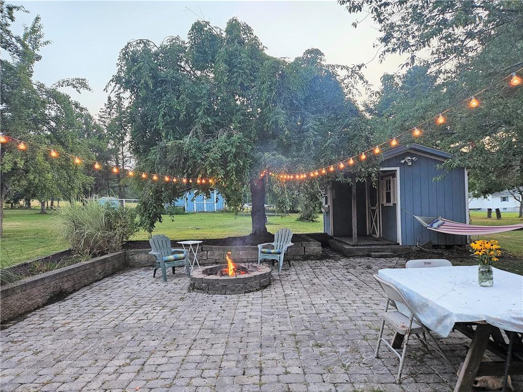 175 Blackfield Road Garrett, PA 15542 - Photo 30 of 37 a backyard of a house with outdoor seating