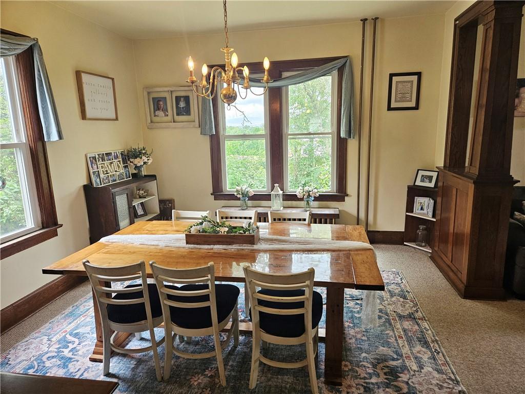 175 Blackfield Road Garrett, PA 15542 - Photo 9 of 37 a view of a dining room with furniture window and wooden floor