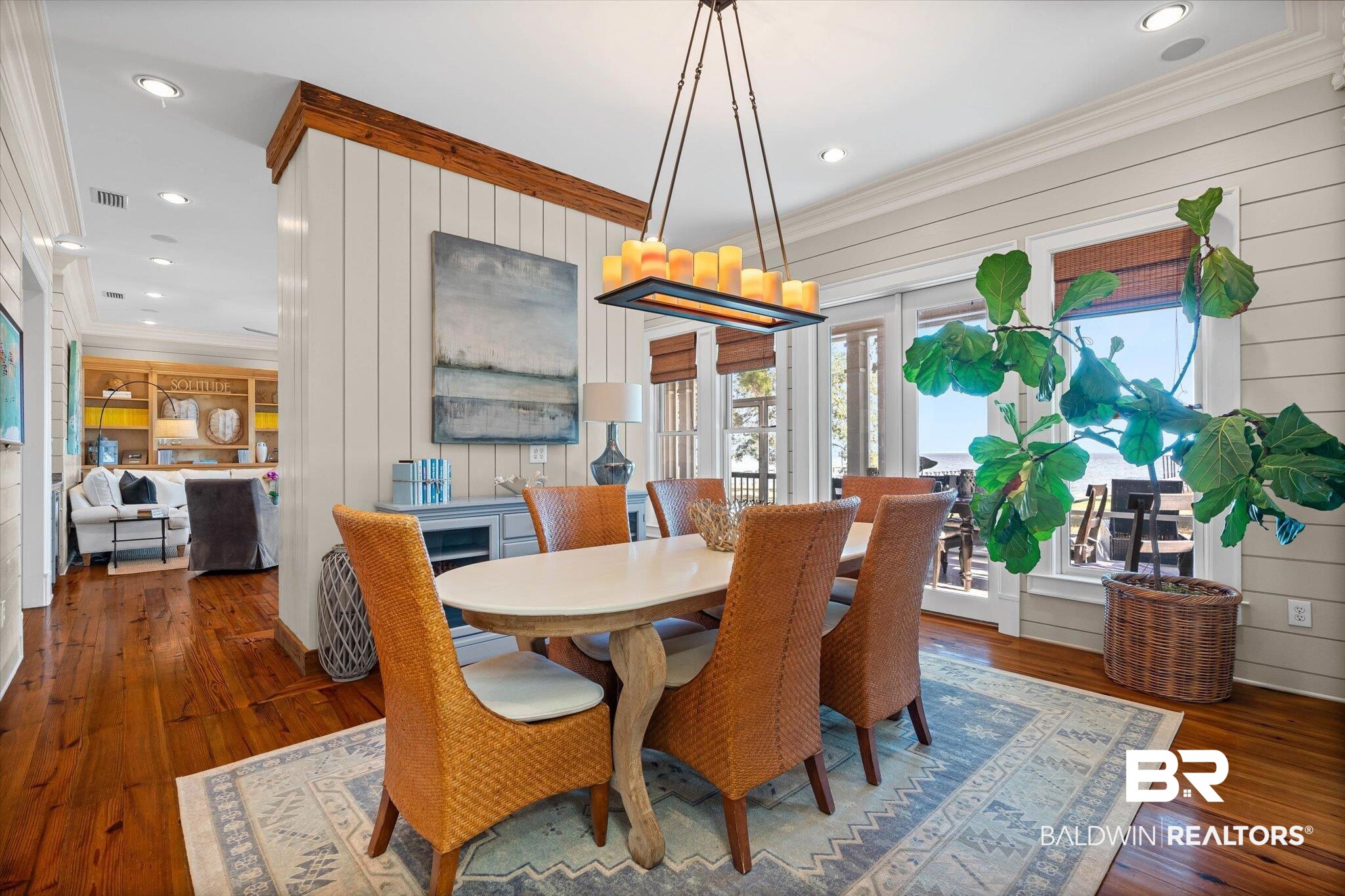 7015 Bay Road Mobile, AL 36605 - Photo 11 of 53 Dining space with ornamental molding, french doors, wood walls, dark wood-type flooring, and recessed lighting