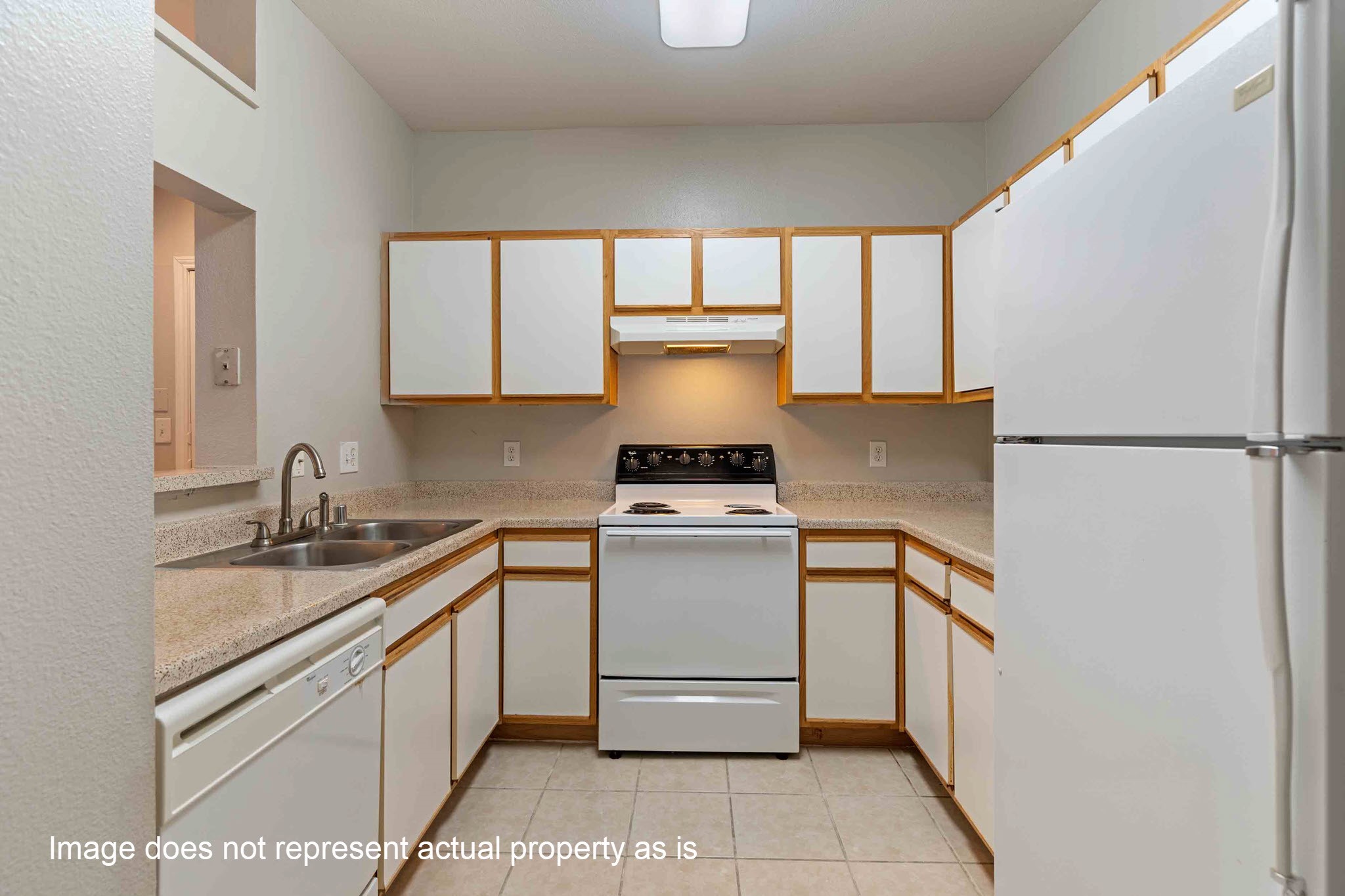 2400-625 Spring Rain Drive Spring, TX 77379 - Photo 7 of 36 a kitchen with a stove and a refrigerator