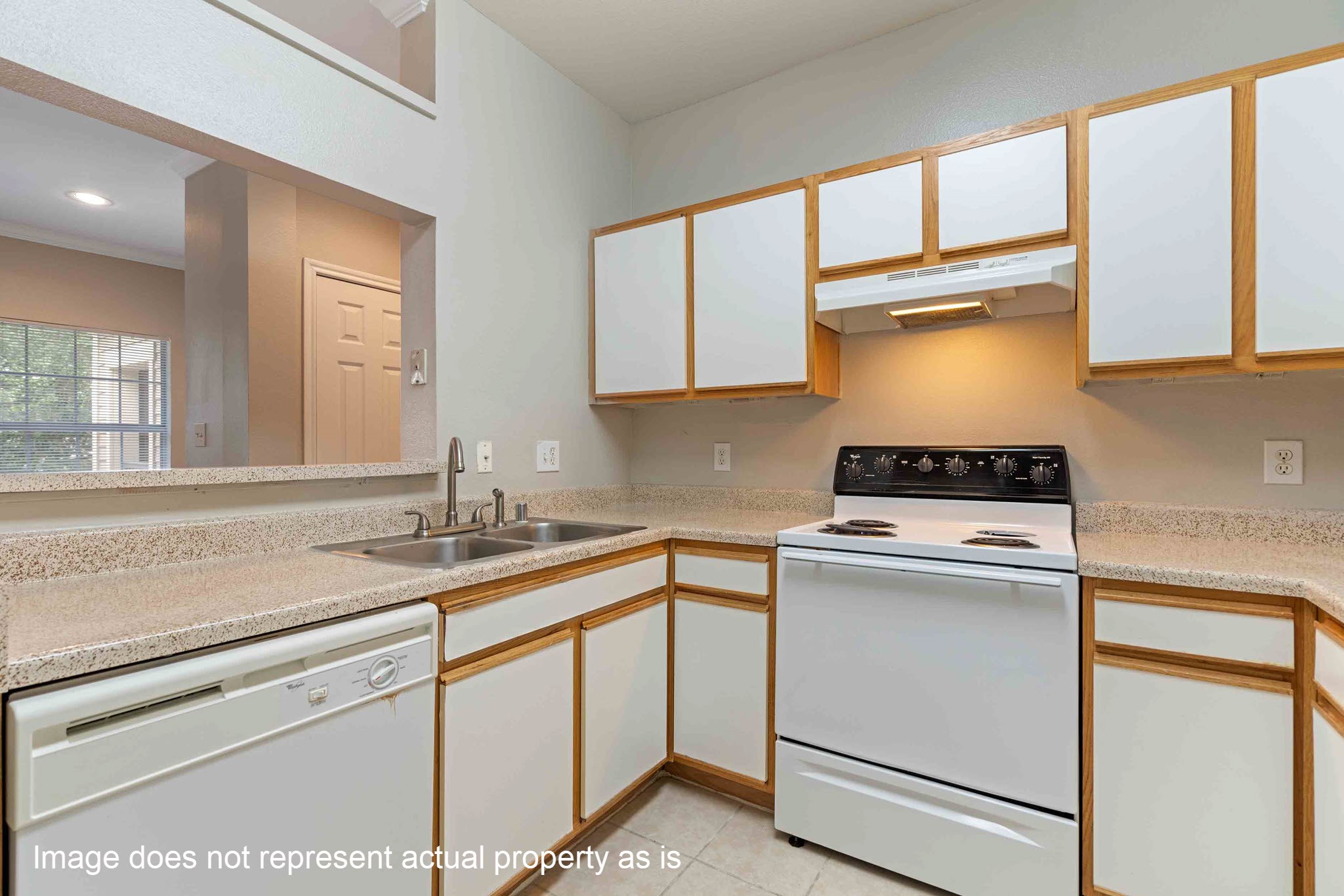 2400-625 Spring Rain Drive Spring, TX 77379 - Photo 8 of 36 a kitchen with a sink stove and cabinets