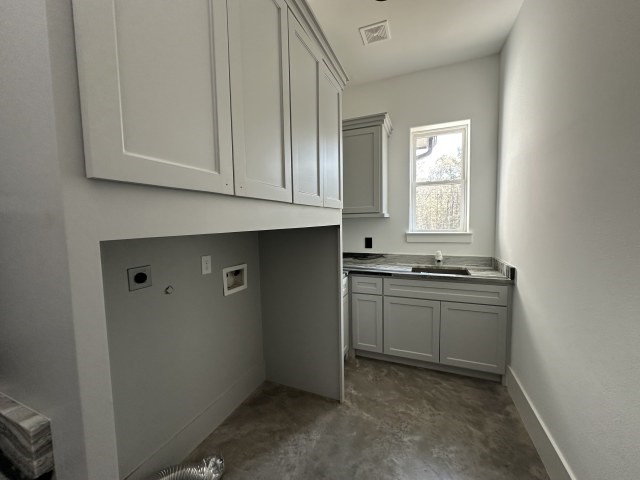 875 Lonestar Road Huntsville, TX 77340 - Photo 23 of 24 a kitchen with granite countertop cabinets stainless steel appliances and a sink