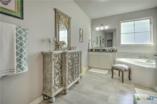 a view of a kitchen with windows