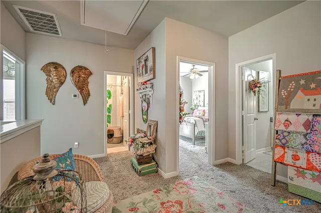 a bedroom with furniture and a bed