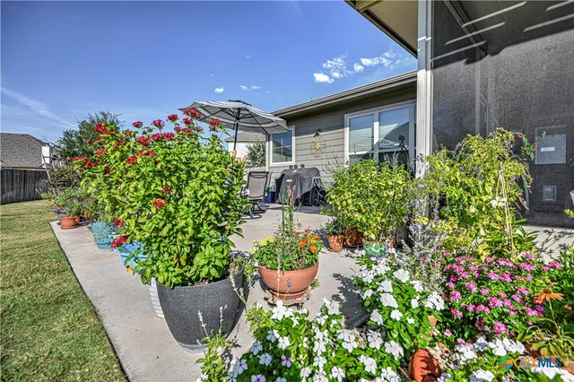 a house with lots of flowers in it