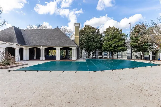 a view of living room kitchen with furniture and floor to ceiling window