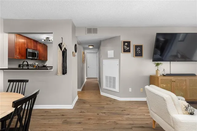 a living room with furniture and a table