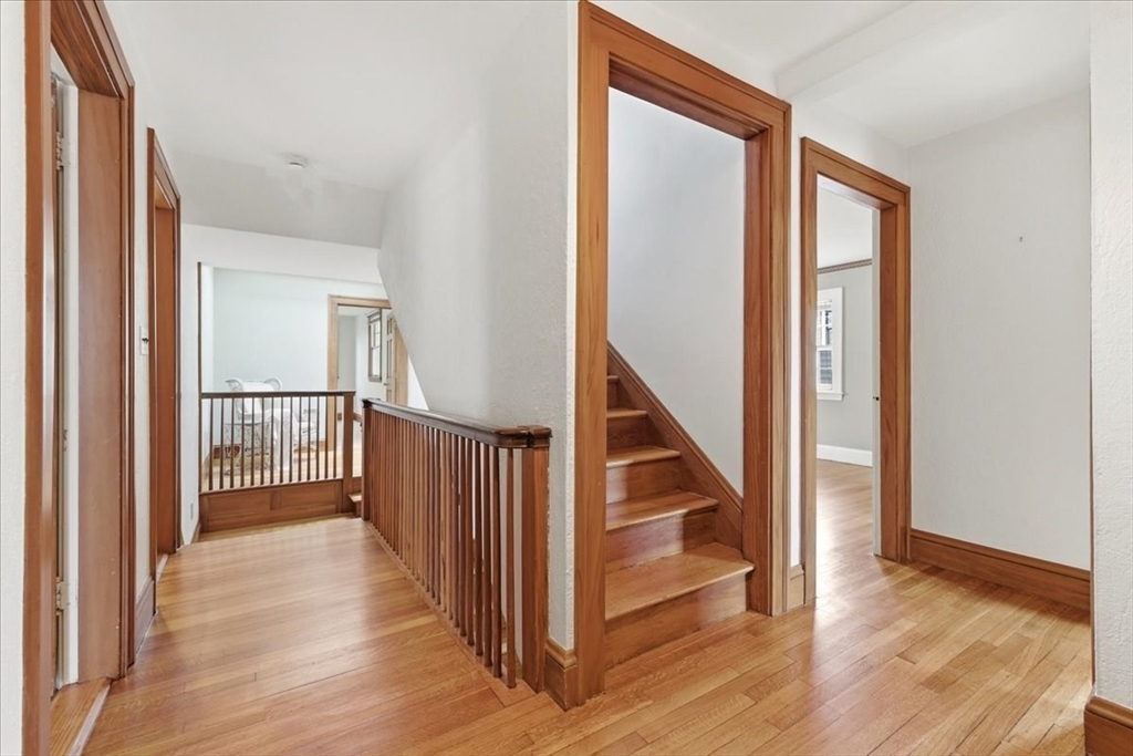 238 Harris Avenue Needham, MA 02492 - Photo 23 of 35 a view of a hallway with wooden floor and entryway
