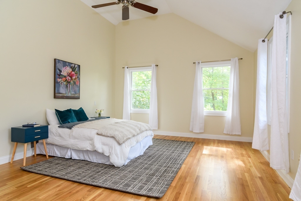 11 Parsons Way Natick, MA 01760 - Photo 11 of 29 a bedroom with a large bed and a window
