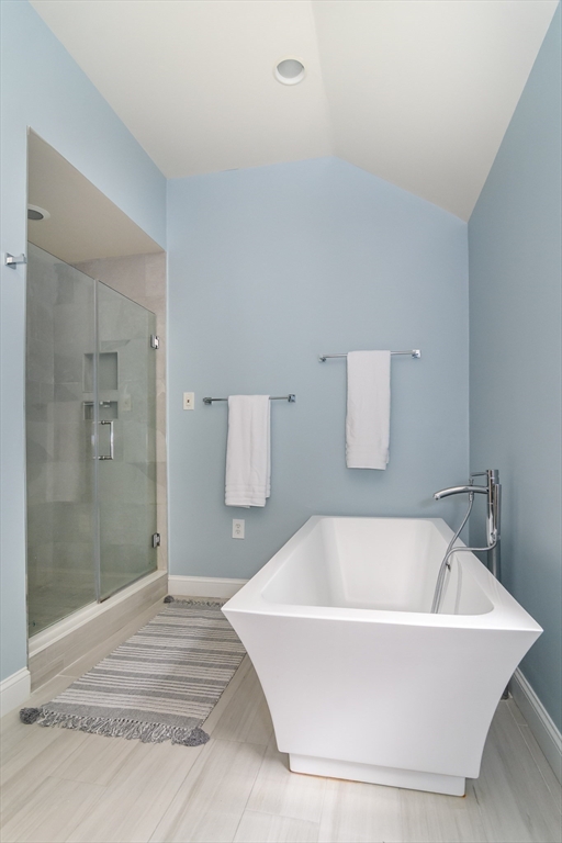 11 Parsons Way Natick, MA 01760 - Photo 14 of 29 a bathroom with a bathtub and shower