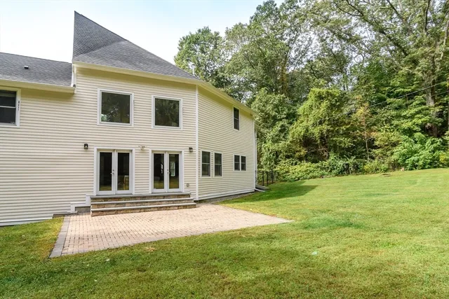 a house view with a garden space