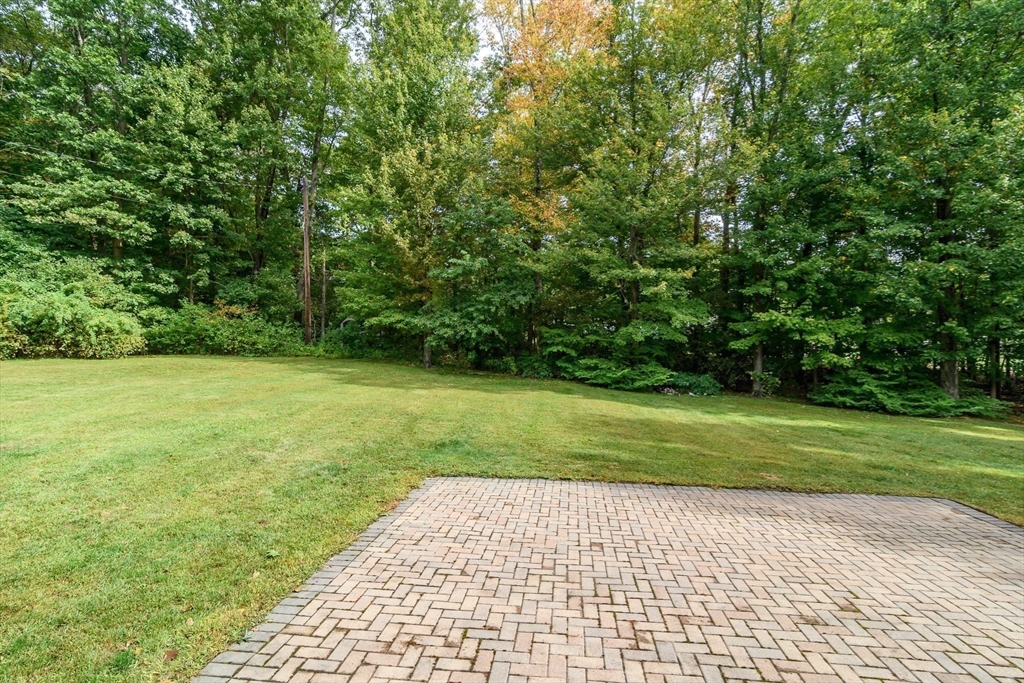 11 Parsons Way Natick, MA 01760 - Photo 22 of 29 a view of a yard with an trees