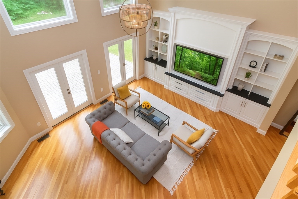 11 Parsons Way Natick, MA 01760 - Photo 6 of 29 a living room with furniture and a flat screen tv