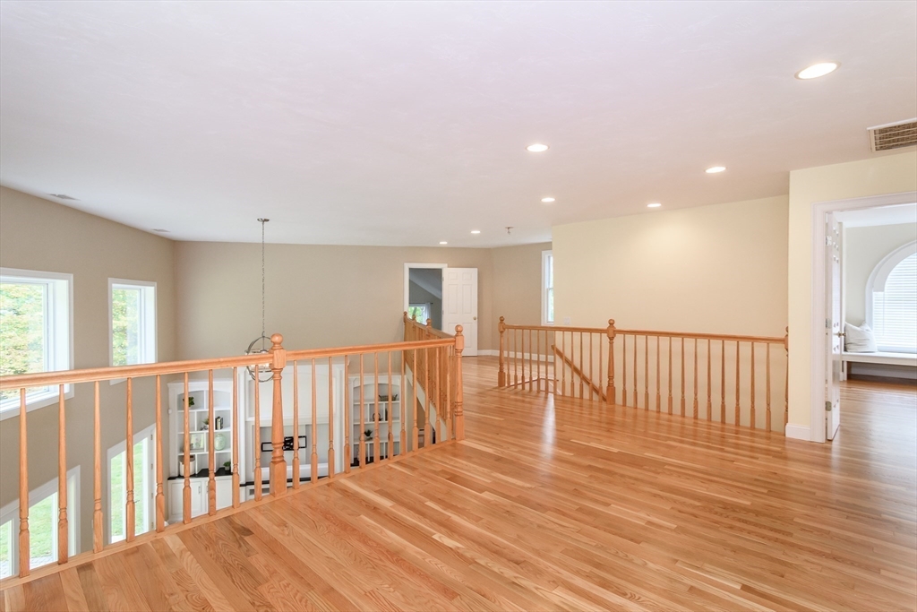 11 Parsons Way Natick, MA 01760 - Photo 10 of 29 a view of a hallway with wooden floor