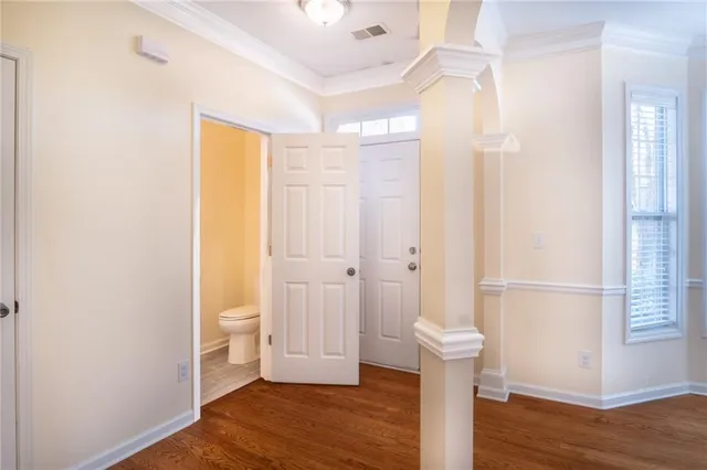 a view of entryway with wooden floor