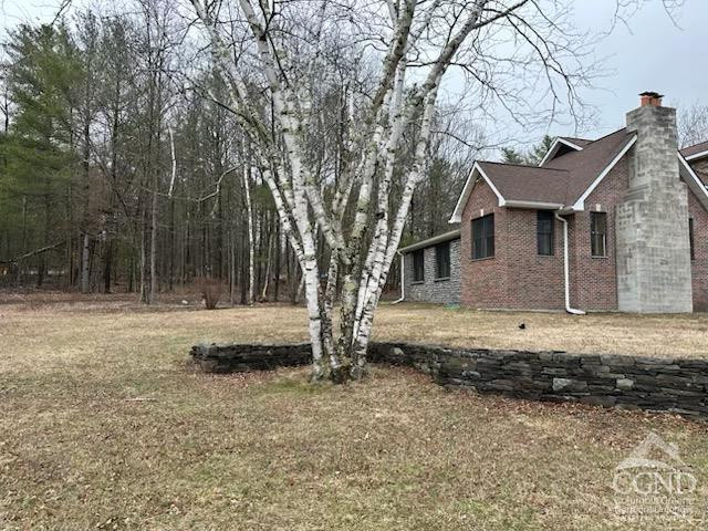 8 Bailey Purling, NY 12470 - Photo 4 of 13 a view of a house with a yard and large tree