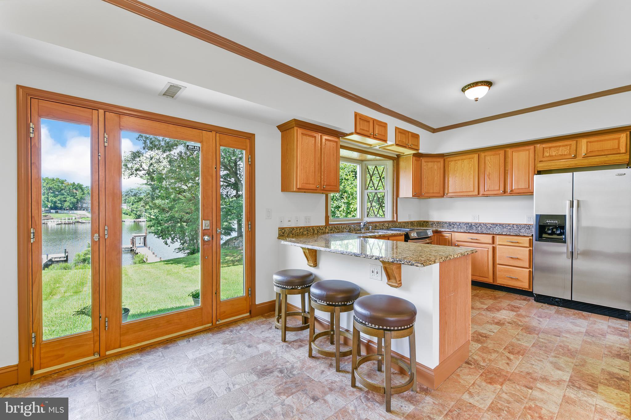 212 Greenland Beach Road Greenland Beach, MD 21226 - Photo 2 of 32 breakfast area and bar