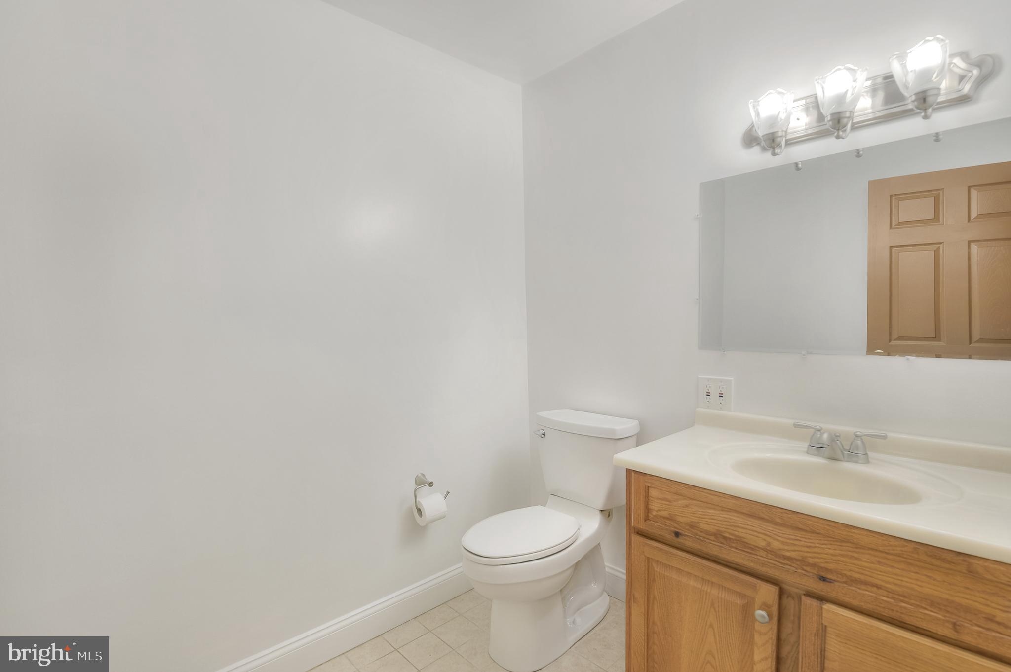 212 Greenland Beach Road Greenland Beach, MD 21226 - Photo 27 of 32 first floor half bath