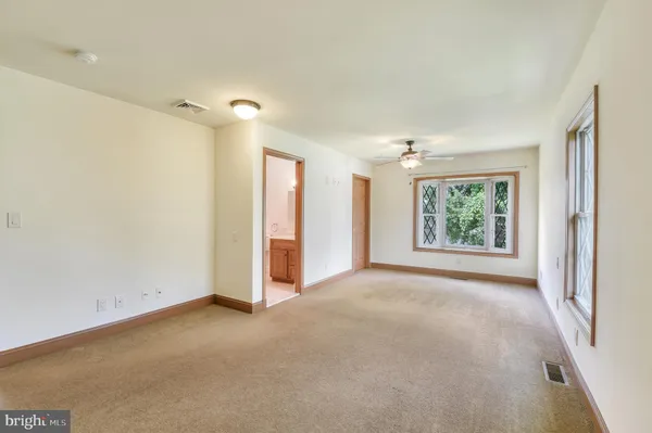 an empty room with windows