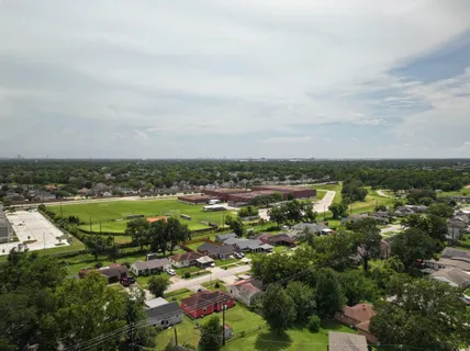 an aerial view of a city with lots of residential buildings