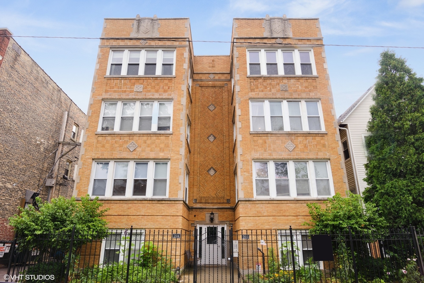 2116 North Spaulding Avenue, Unit 21163 Chicago, IL 60647 - Photo 1 of 18 front view of a building
