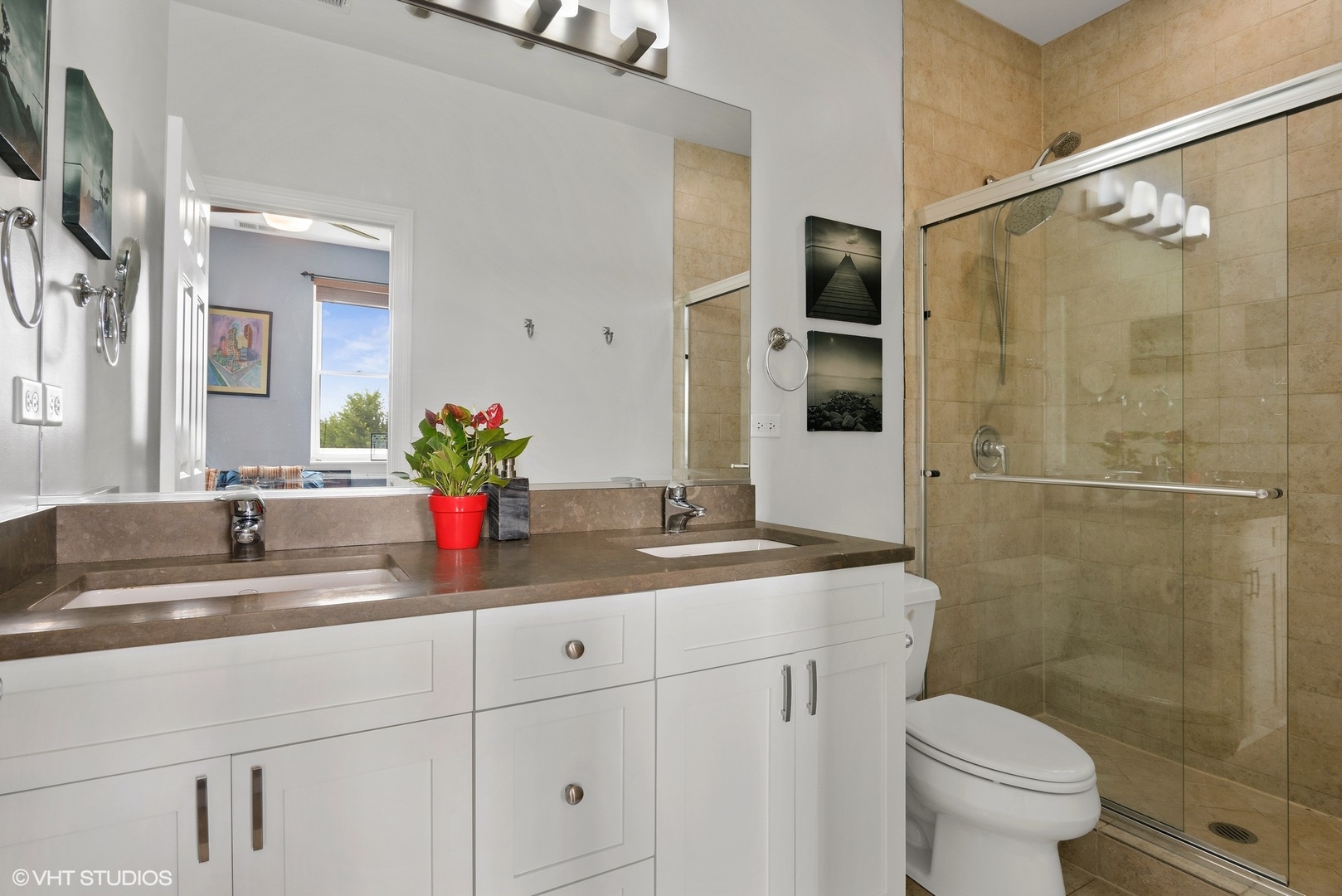 2116 North Spaulding Avenue, Unit 21163 Chicago, IL 60647 - Photo 11 of 18 a bathroom with a sink a toilet and shower