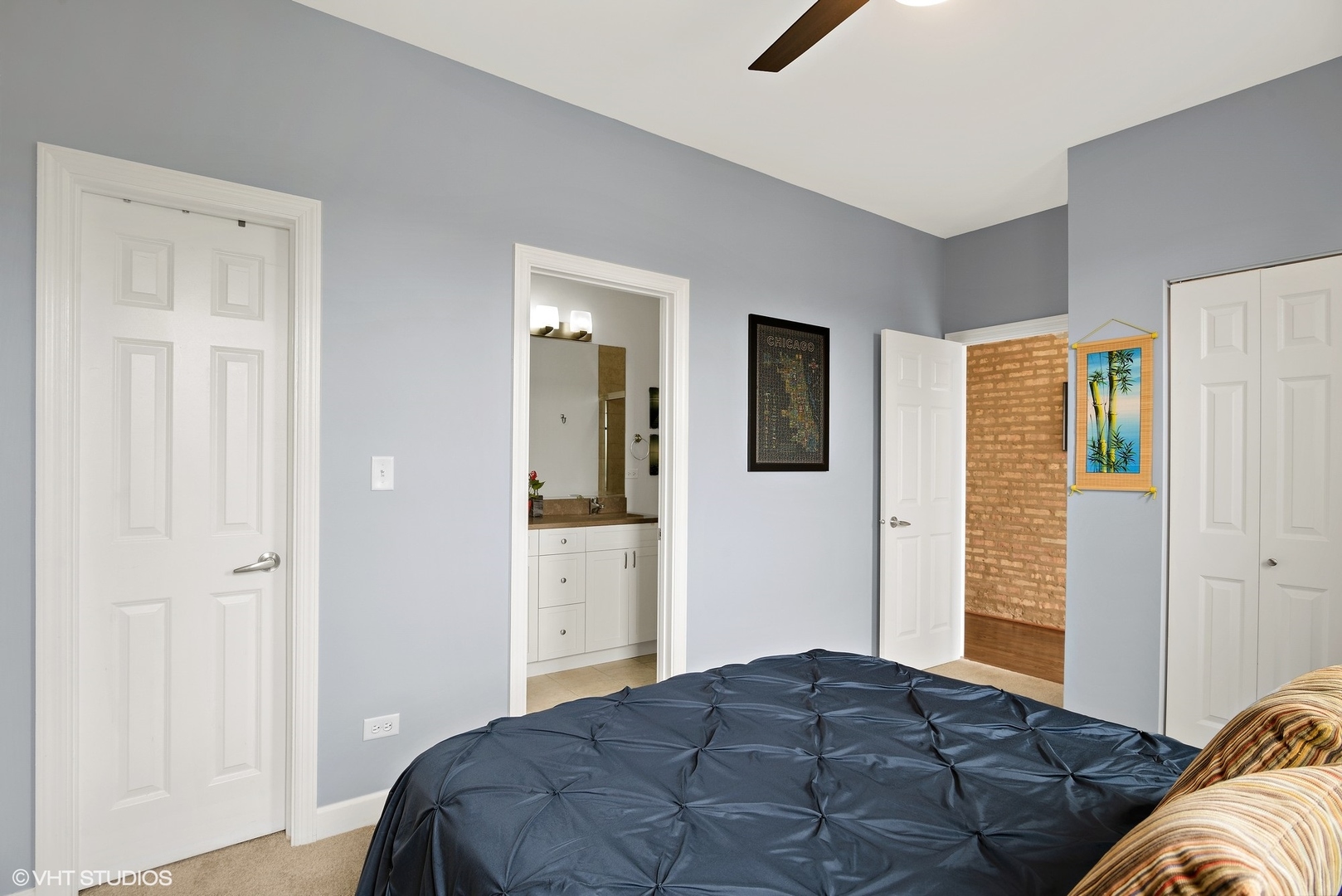 2116 North Spaulding Avenue, Unit 21163 Chicago, IL 60647 - Photo 10 of 18 a bedroom with a bed and a closet