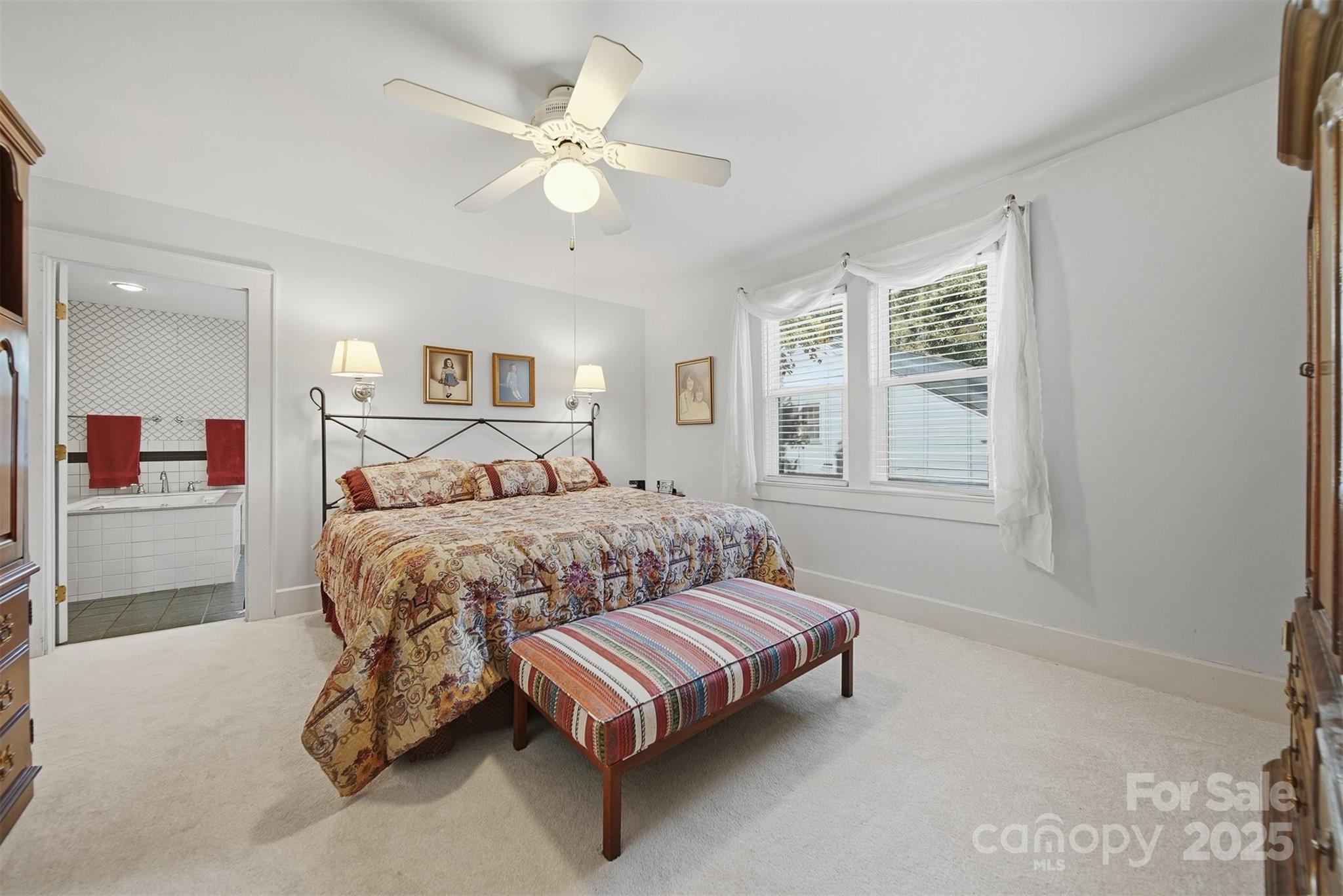 619 4th Street Northeast Hickory, NC 28601 - Photo 22 of 38 a bedroom with a bed and a window