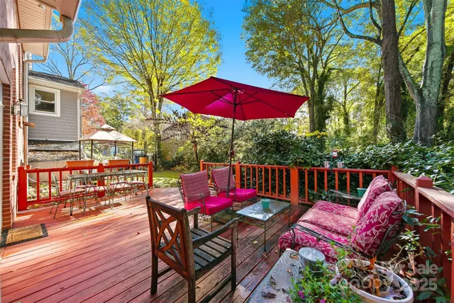 a view of balcony with deck and outdoor seating