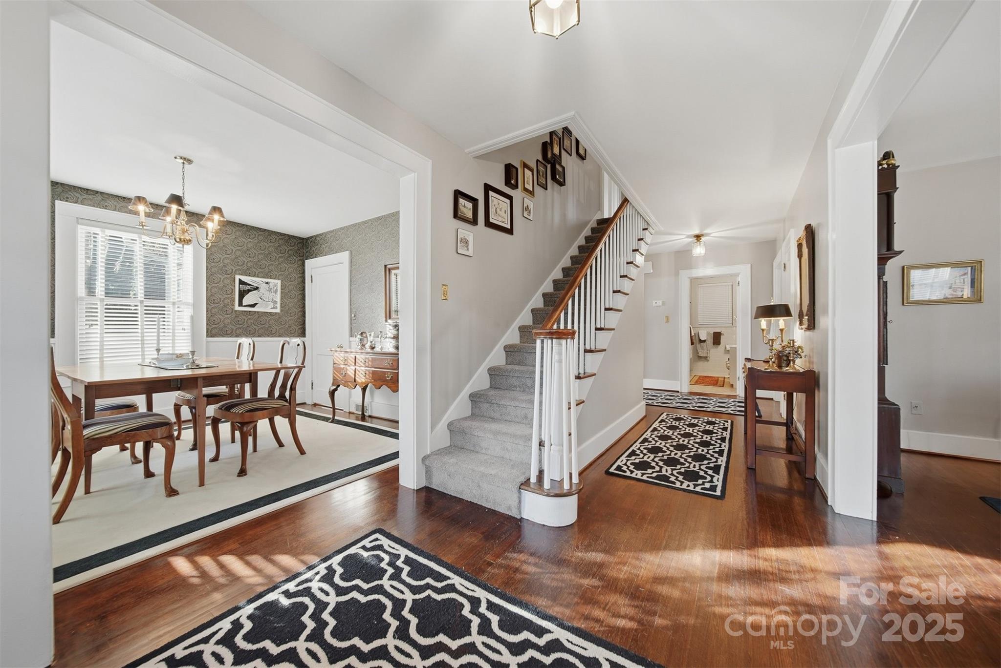 619 4th Street Northeast Hickory, NC 28601 - Photo 3 of 38 a view of entryway and hall with wooden floor