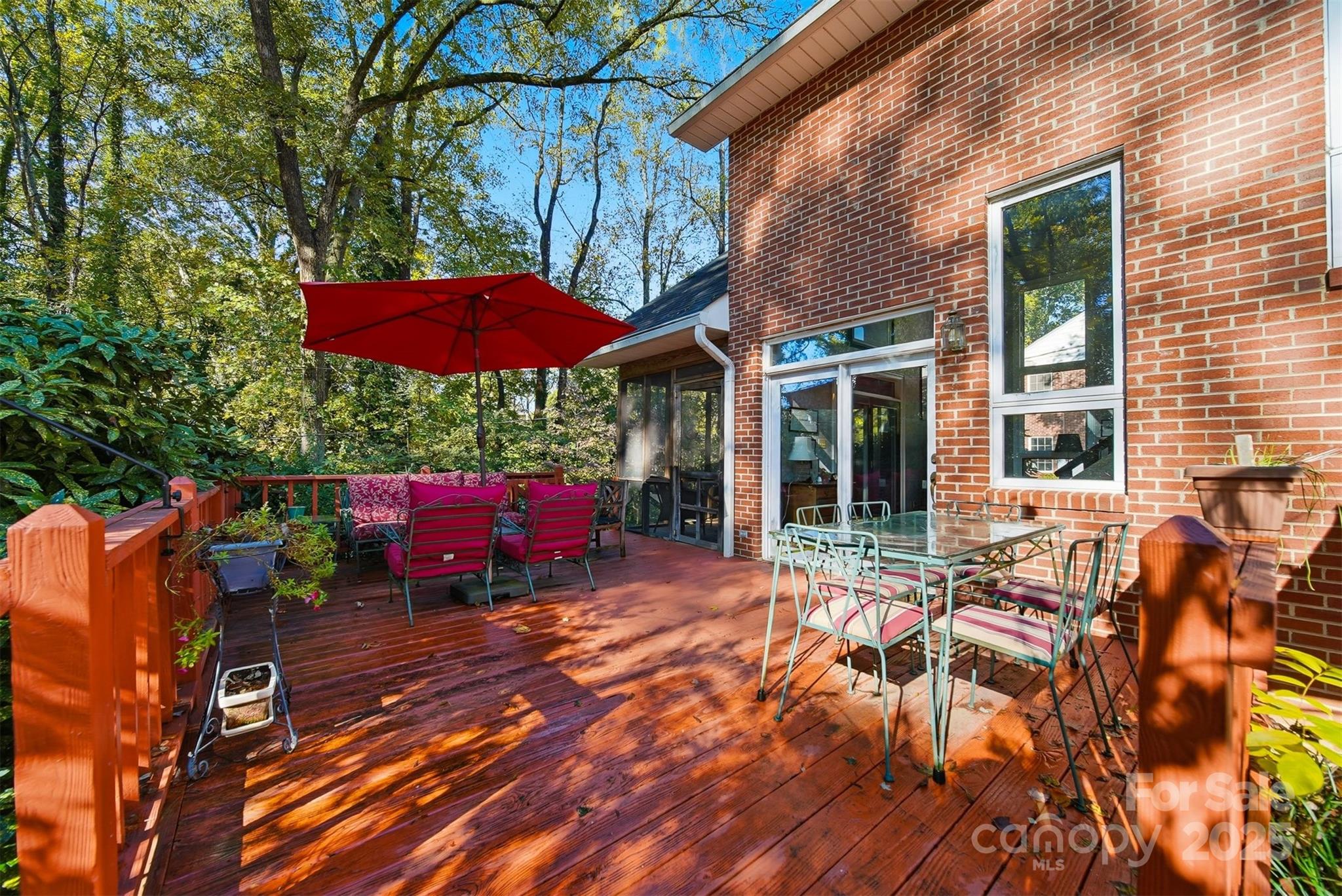 619 4th Street Northeast Hickory, NC 28601 - Photo 31 of 38 a view of a house with backyard sitting area and a patio