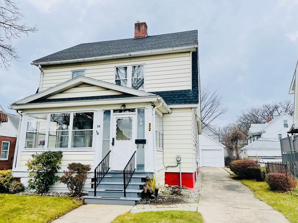 22 Thames Street Springfield, MA 01104 - Photo 2 of 15 a view of a house with sitting area and a small yard