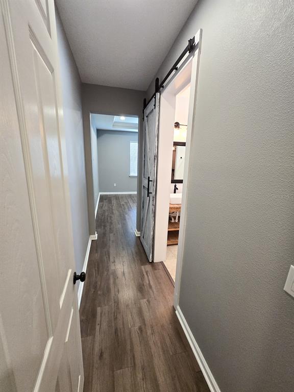 3543 Meadow Breeze Loop Ocoee, FL 34761 - Photo 16 of 38 a view of a hallway with wooden floor and staircase
