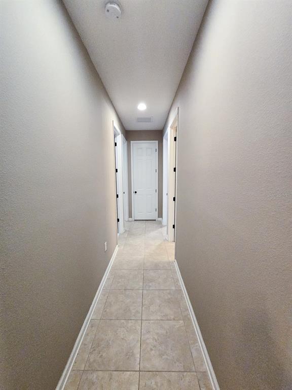 3543 Meadow Breeze Loop Ocoee, FL 34761 - Photo 26 of 38 a view of hallway