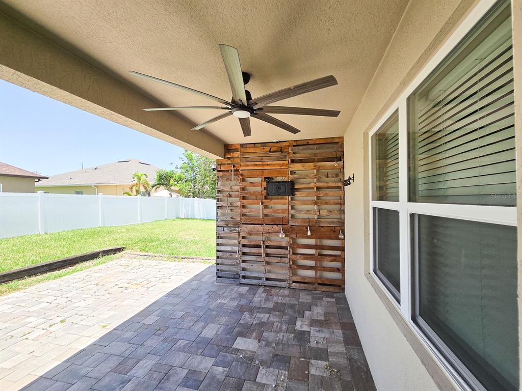 3543 Meadow Breeze Loop Ocoee, FL 34761 - Photo 33 of 38 a view of a ceiling fan and wooden floor