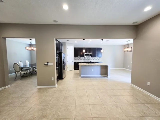 a view of a kitchen with a sink