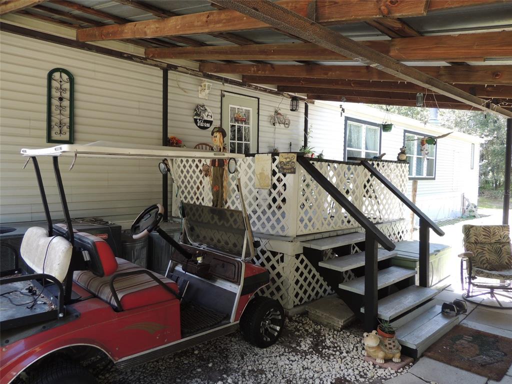 7050 Southeast Co Road 337 Morriston, FL 32668 - Photo 11 of 67 a view of workspace with wooden floor