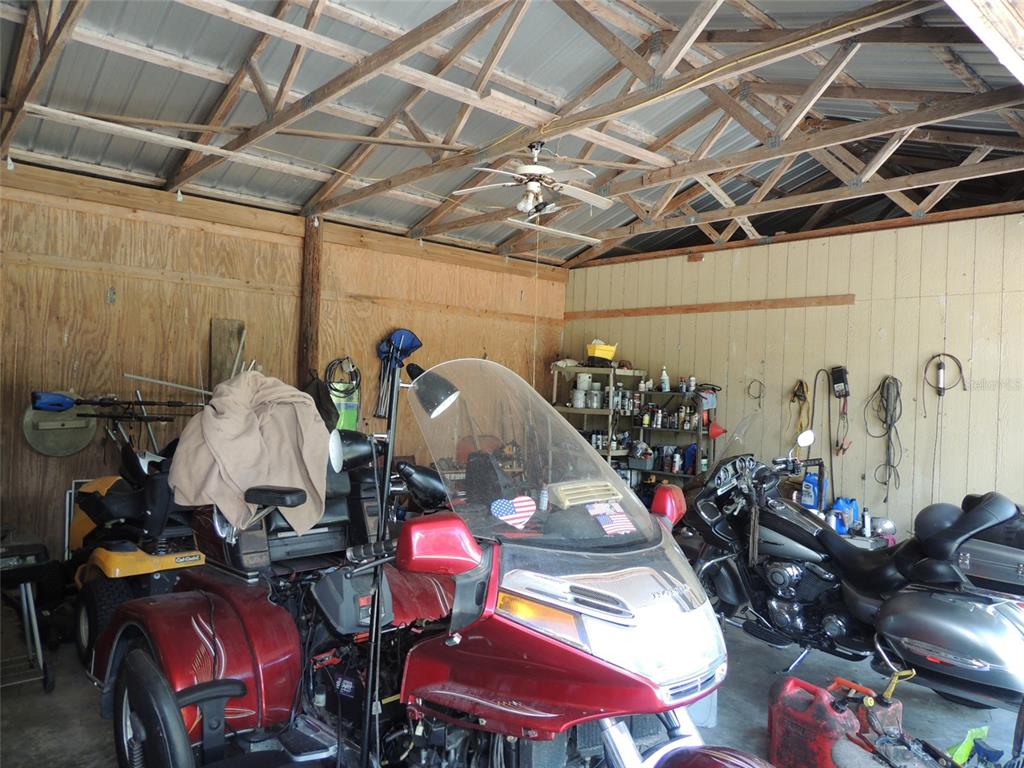 7050 Southeast Co Road 337 Morriston, FL 32668 - Photo 19 of 67 a view of a room with gym equipment